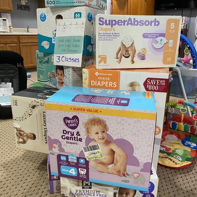 Join our Baby Bucks Program and Earn While You Learn! Just 3 Classes earns a Box of Diapers!