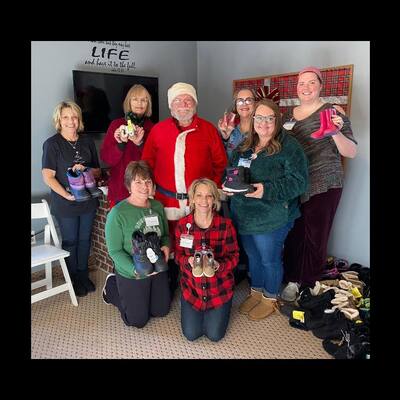 Each Christmas PCOM gives our 80-100 pairs of Boots during our Cookies with Santa days!